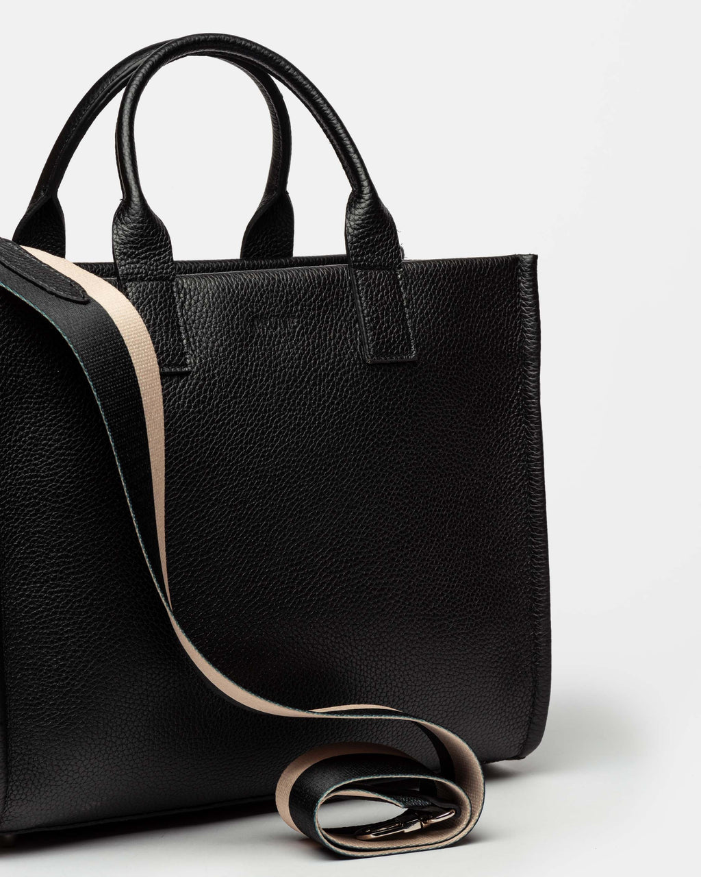 Cartera de mano Capri en cuero graneado