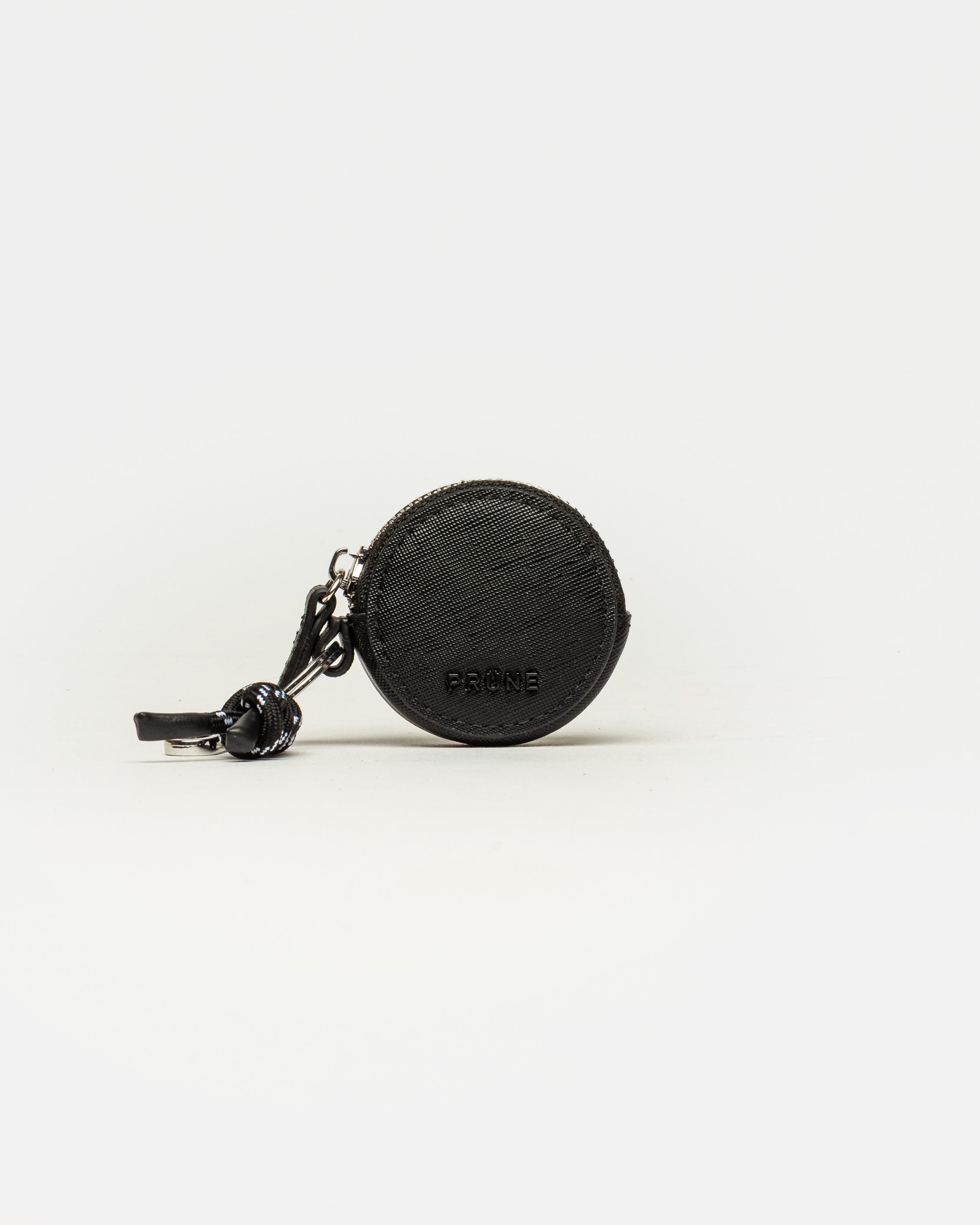 Llavero Charm Round en efecto cuero